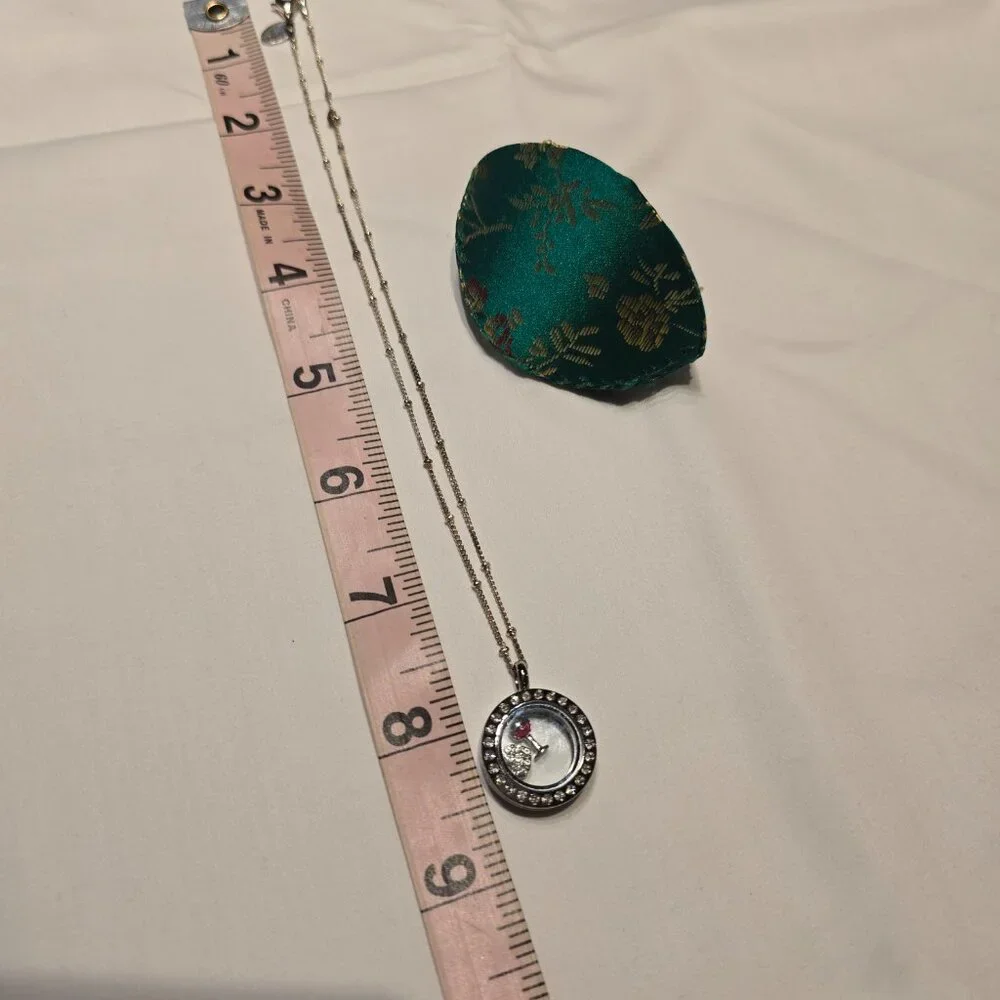 Origami Owl floating locket with wine and heart charm, VGUC Silver tone.